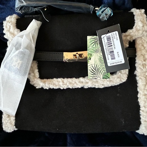 Badgley Mischka
Suede/shearling trim crossbody satchel - Picture 2 of 7